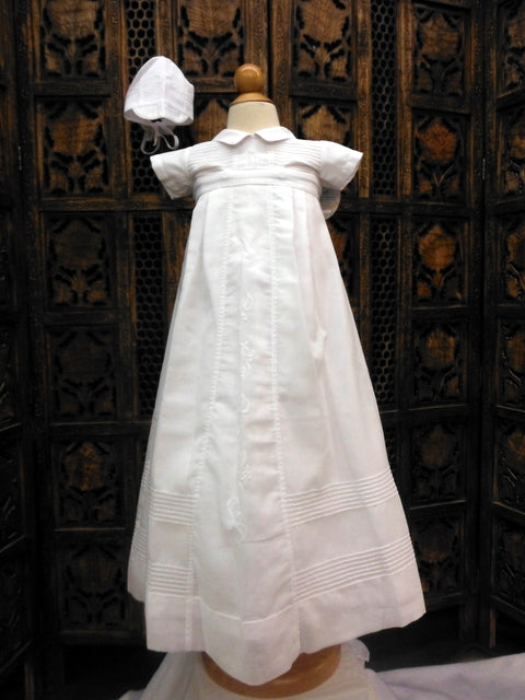 Our range of simple cotton and silk christening gowns handmade in London,  UK.